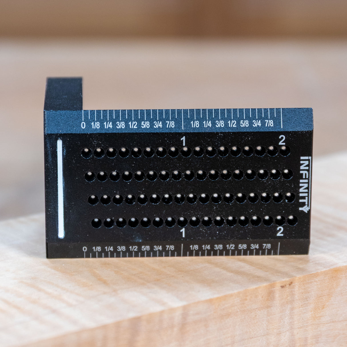 Edges are marked in 1/16" increments.