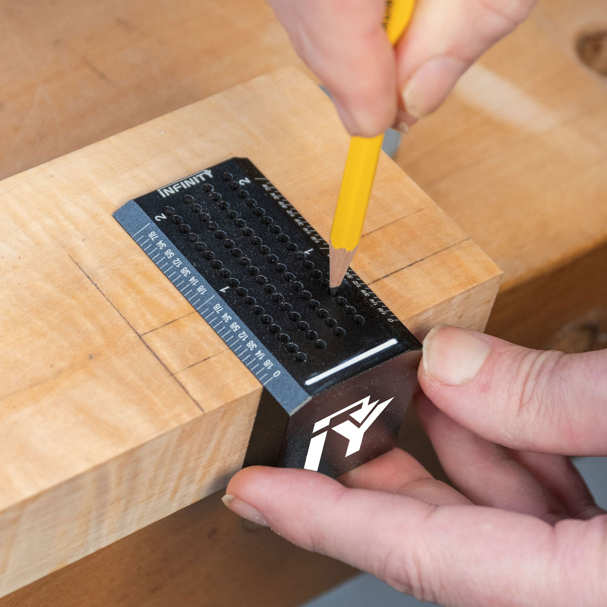 The pencil holes allow for perfect lines away from the edge.