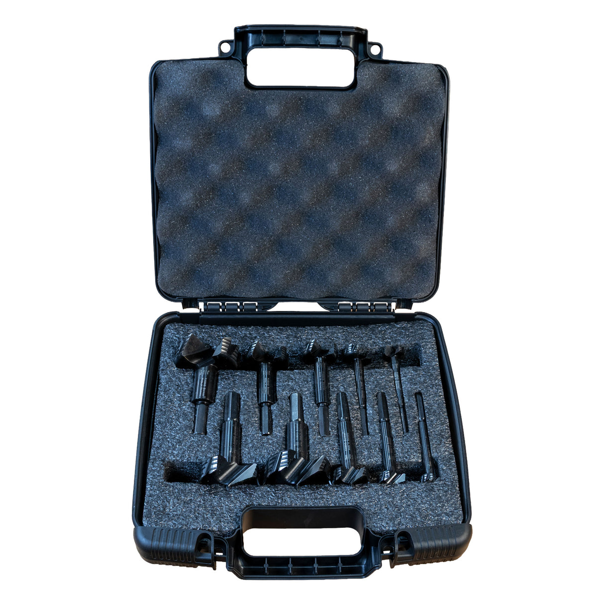 Black tool case with compartments holding black Famag forstner bits on a white background