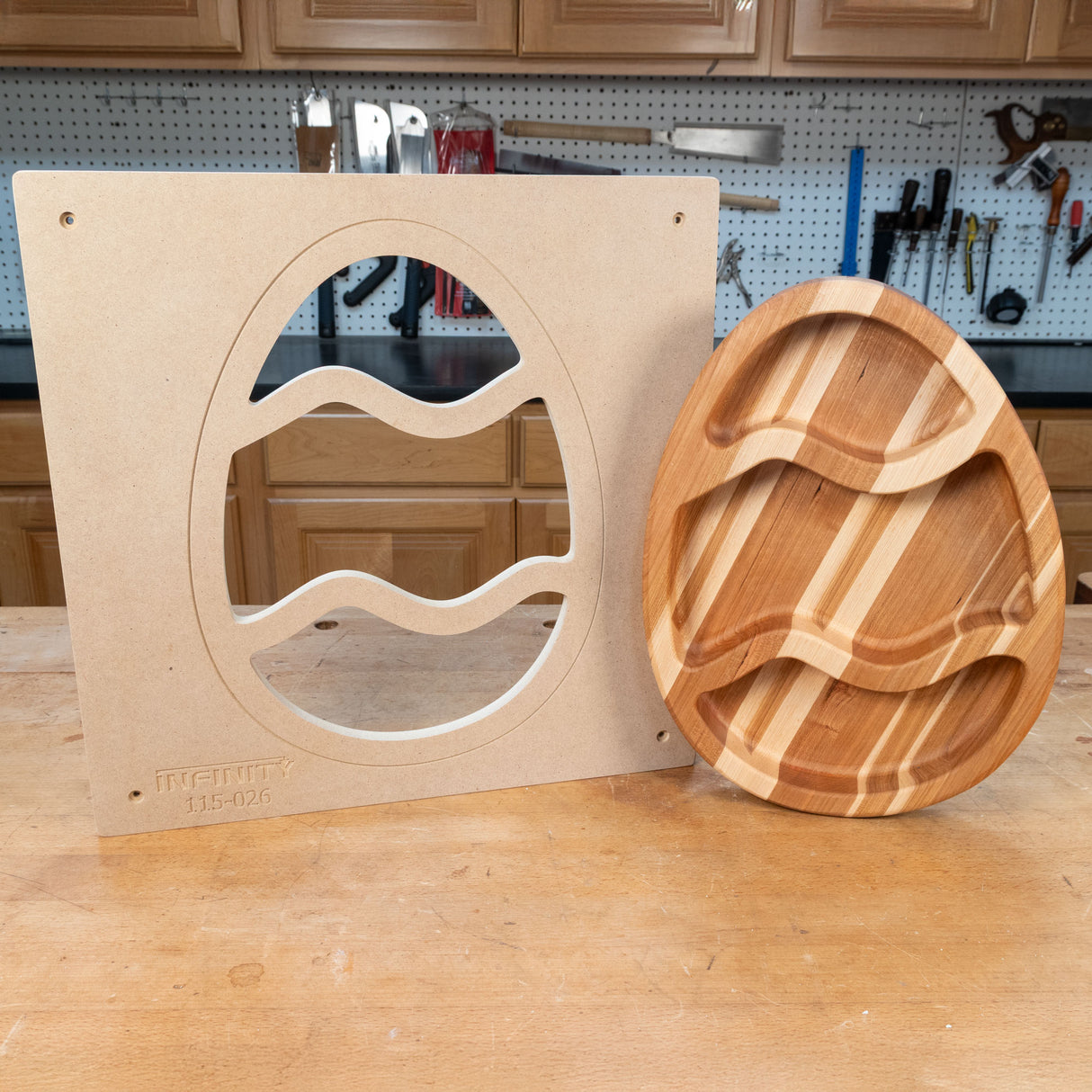 Woodworking Easter egg tray template and finished striped wood serving tray on workshop table