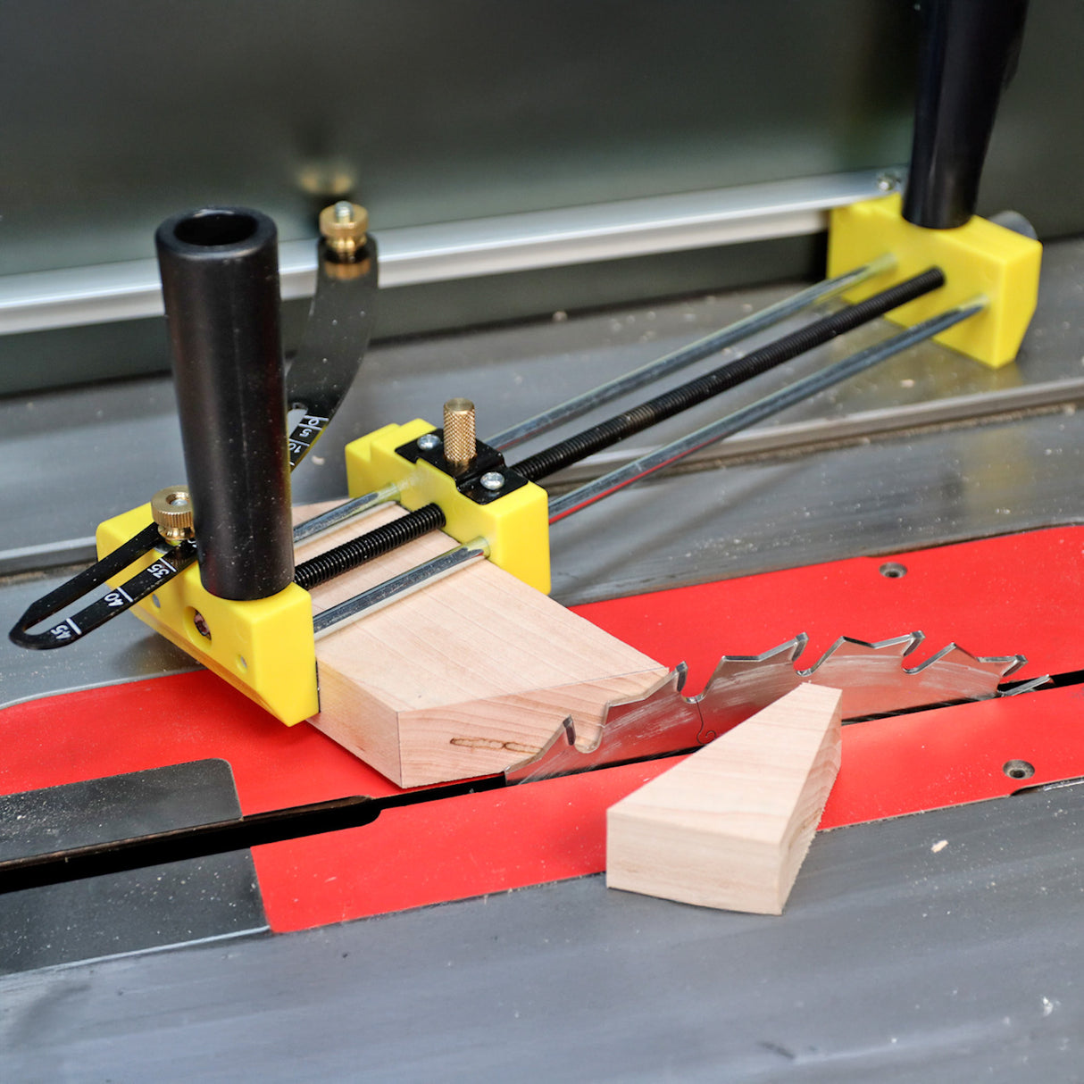 The jig can reference off the fence for smooth cuts.