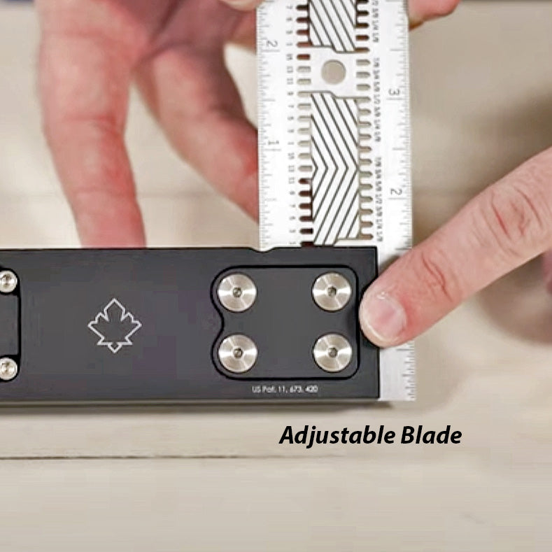 Adjustable woodworking blade tool with precision ruler on light wood surface