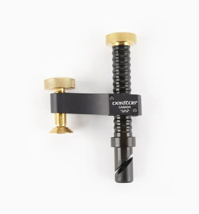 Veritas dowel drilling jig with brass adjustment knobs for precise woodworking