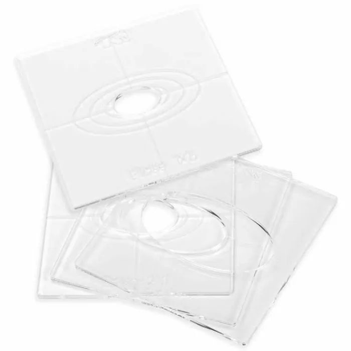 Set of clear square router table insert plates for woodworking, stacked on white background