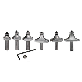 Set of six round over router bits with hex key and bearing on white background