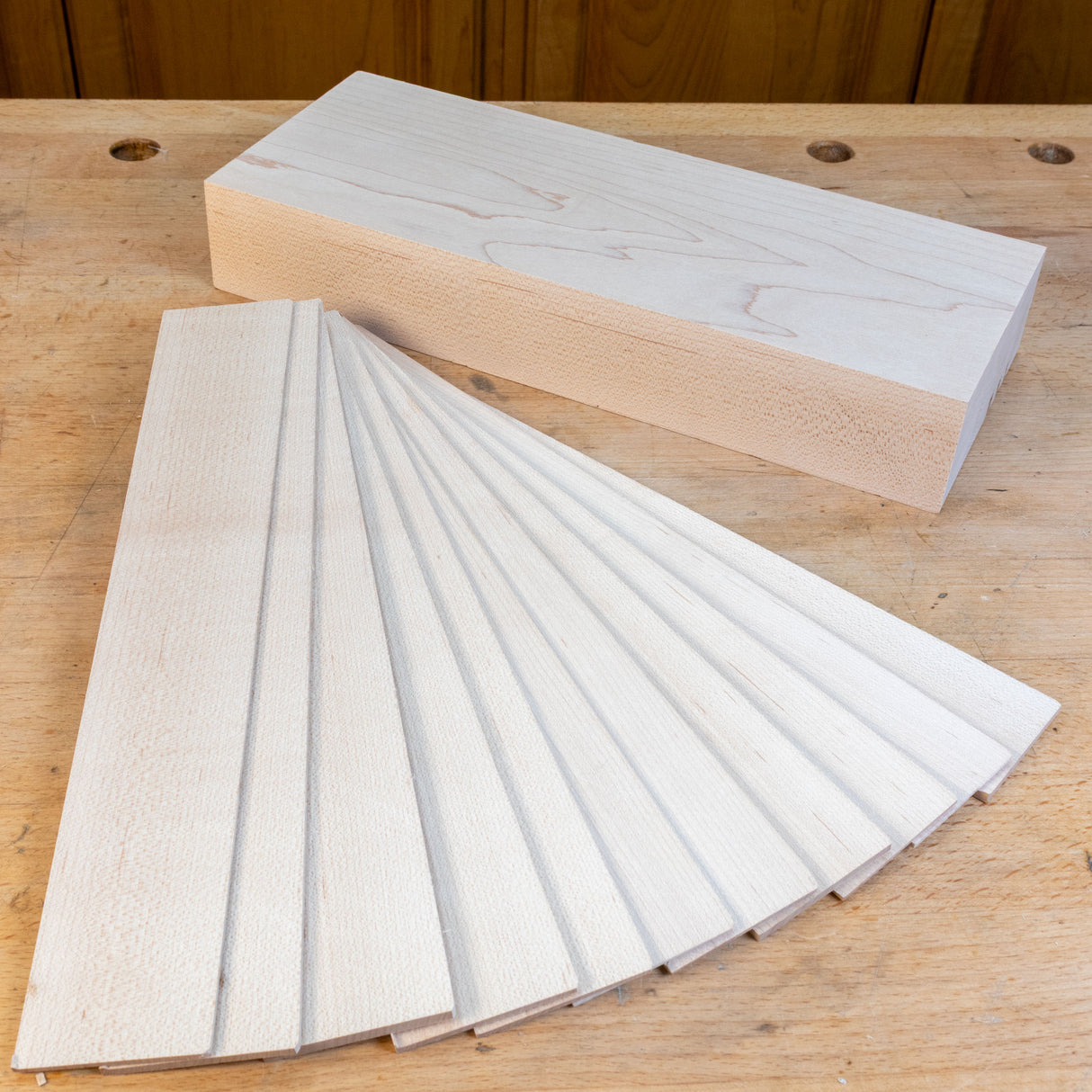Wood rip cuts on a wood bench.