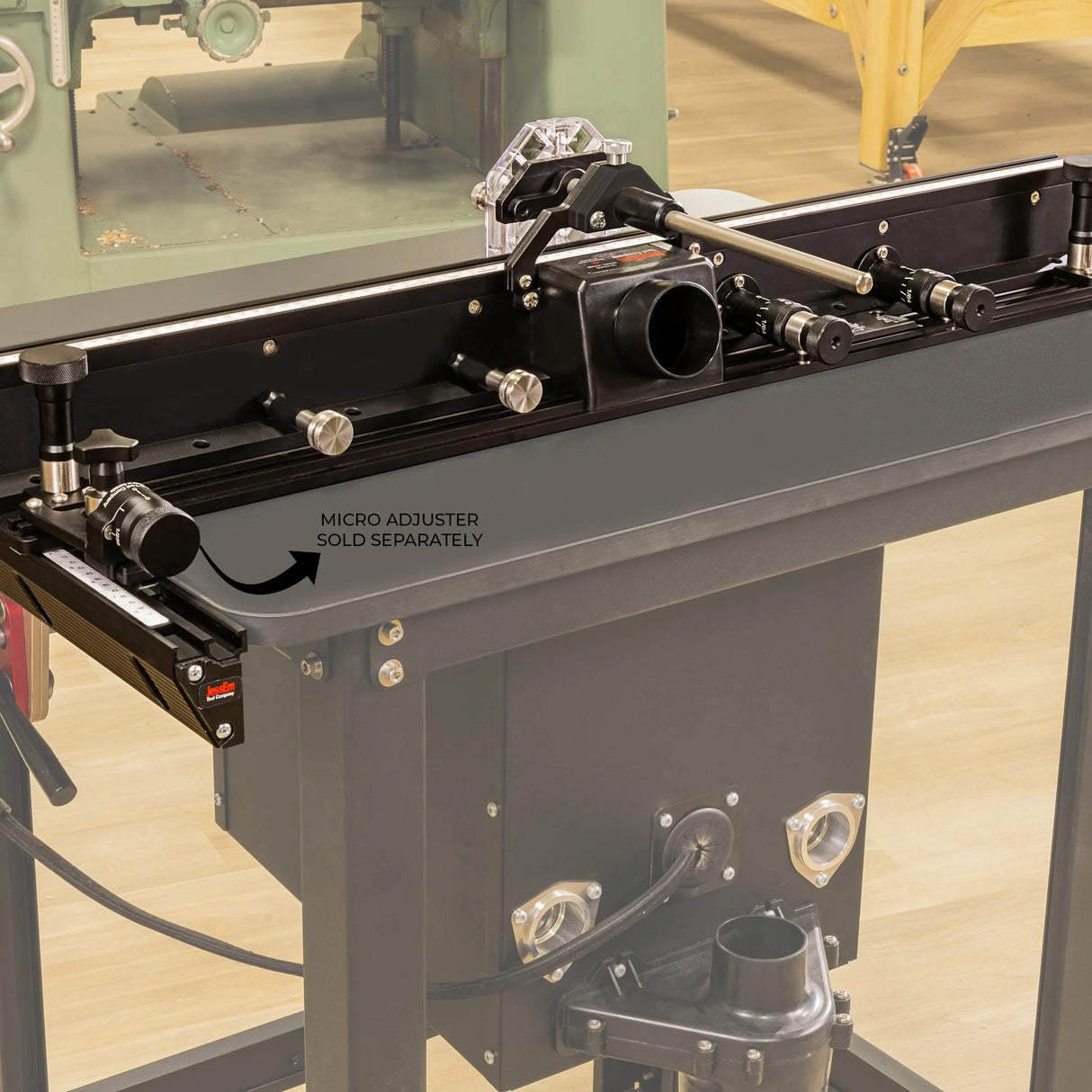 Router table fence with dust collection port, precision adjustment knobs, and micro adjuster.