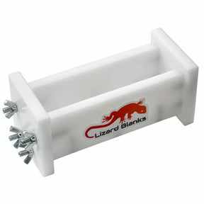 White resin casting mold with screws, labeled Lizard Blanks, for woodworking projects