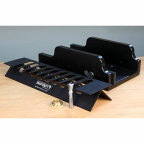 Woodworking dovetail jig set with router bit and guide on a workbench