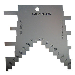 Metal woodworking setup gauge with stair-step notches and engraved inch measurements