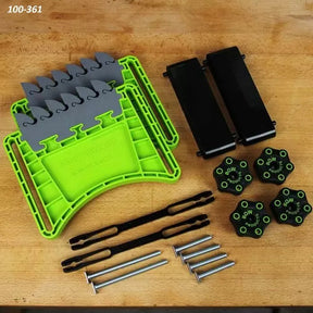 Bow Products T-Track featherboard kit with green and black woodworking tool parts on a wood surface.