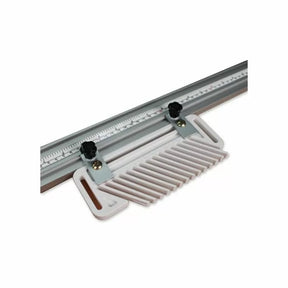 Table saw featherboard with adjustable guide and ruler for woodworking precision