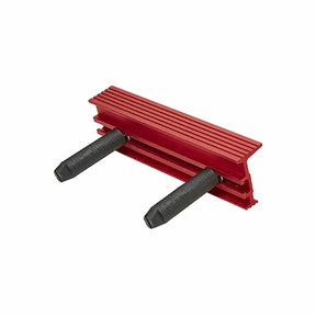 Red woodworking featherboard with dual black adjustment knobs for router table safety