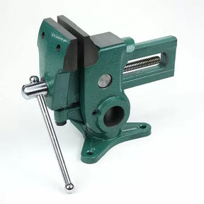 Heavy-duty metal bench vise with green finish on a white background