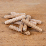 Wooden dowels on a wooden surface