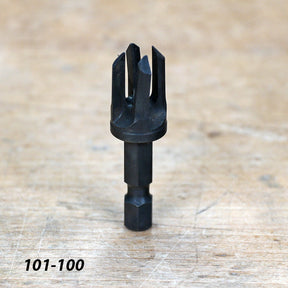 Woodworking countersink drill bit with hex shank on a wooden workbench