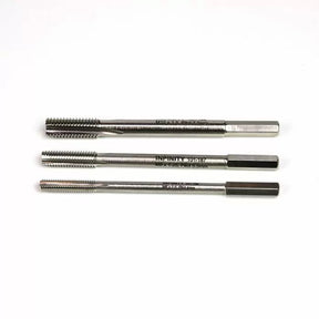 Set of three high speed steel thread hand taps for woodworking and metalworking on white background