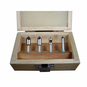 Woodworking router bit set in wooden case, four precision metal bits for cutting and shaping wood