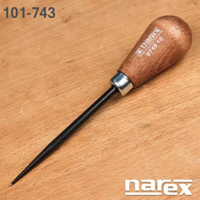 Woodworking marking awl with wooden handle and steel point on a wood surface