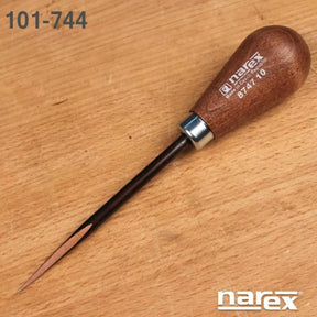 Woodworking marking awl tool with wooden handle on a workbench