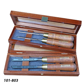 Set of four Narex wood carving chisels with wooden handles in a wooden case
