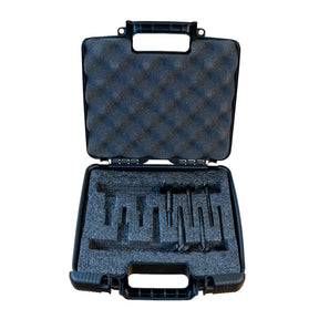 Black hard-shell carrying case with foam interior with Famag forstner bits on a white background