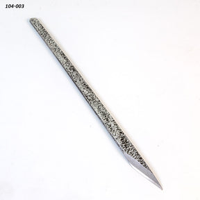 Steel carpenter's scribe with textured handle and sharp point on white background
