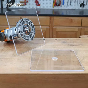 Clear acrylic router base plates on woodworking bench for router tool precision setup