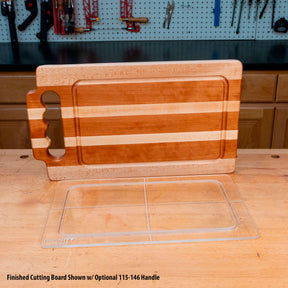 Clear acrylic cutting board template next to finished wood cutting board on workbench
