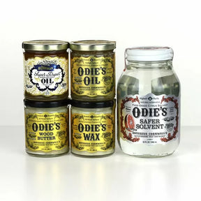 Wood finish and solvent jars including Odie's Oil, Wax, Wood Butter, and Safer Solvent.