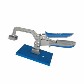 Horizontal toggle clamp with blue base and handles for woodworking projects