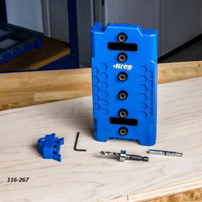 Kreg pocket hole jig kit with drill bit, wrench, and accessories on a woodworking bench