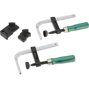 Set of two metal bar clamps with green handles and plastic clamp pads for woodworking