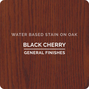 Black Cherry water based stain sample on oak wood with visible grain texture.