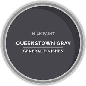 Queenstown Gray milk paint sample by General Finishes in a round paint swatch.
