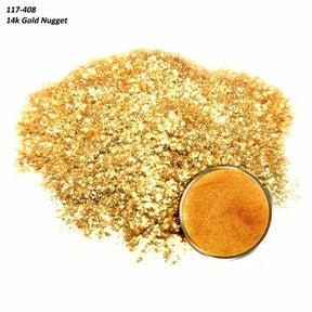 Loose 14k gold nuggets with a small gold dish on a white background