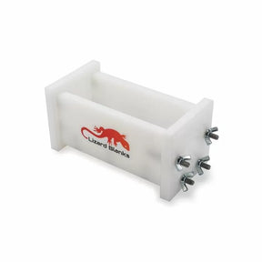 Acrylic resin casting mold with screws and Lizard Blanks logo for woodworking projects