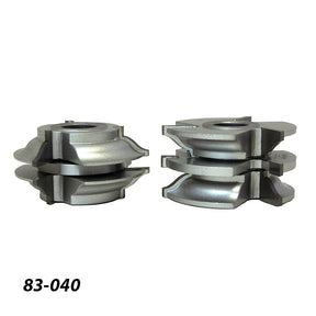 Set of two metal woodworking router bit cutters with stacked profiles on white background