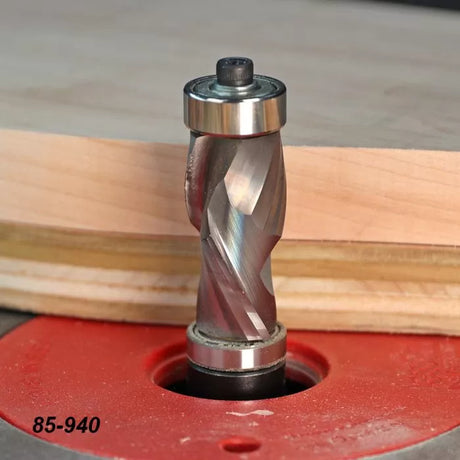 Spiral flush trim router bit on router table cutting plywood edge