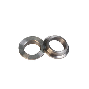 Pair of metal router table flange bushings for woodworking tools on white background