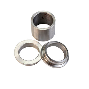 Three metal bushings for woodworking tools on a white background