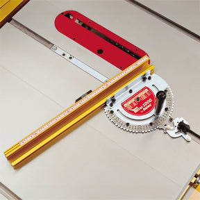 Table saw with precision miter gauge and aluminum fence for woodworking projects