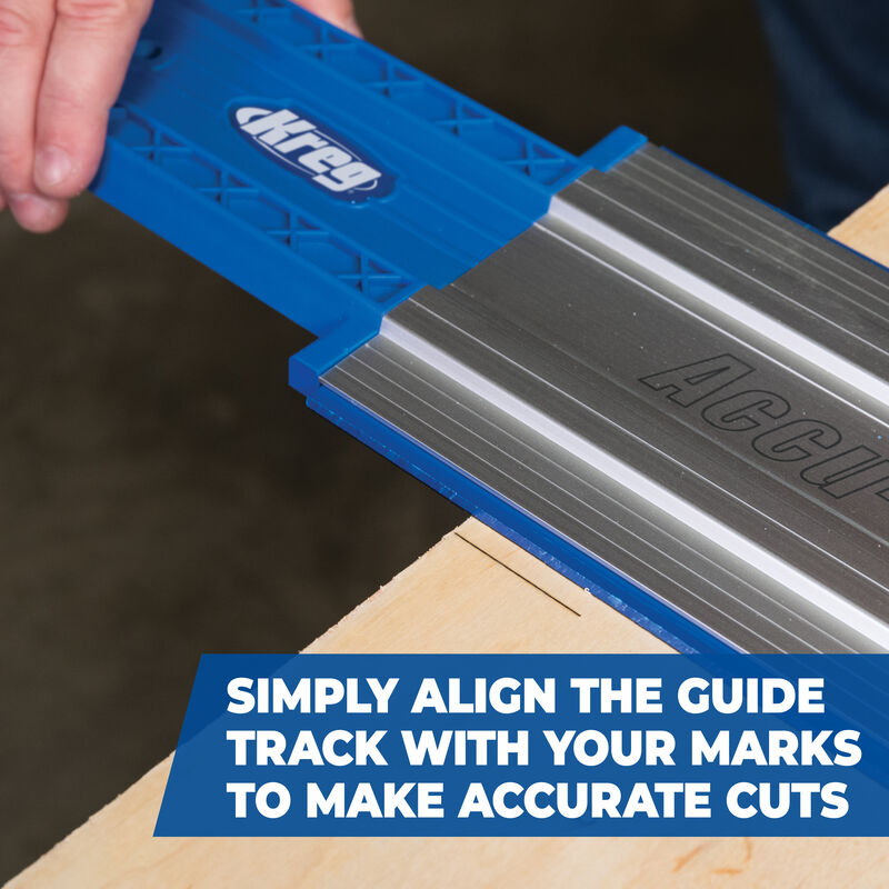 Accu-Ject guide track with blue handle on a wooden surface, featuring the Dremel brand.