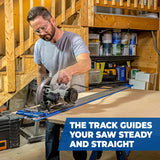 Man using a circular saw with a track guide in a workshop setting.