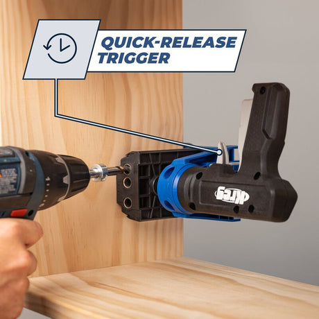 person using a drill guide clamped to a piece of wood.