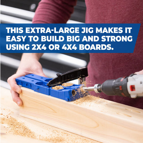 Person using an extra-large pocket hole jig with a power drill on a wood board.