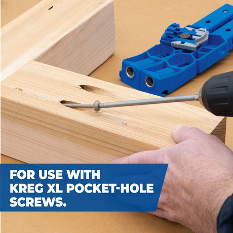 Drill driving screw into pocket-hole joint in wood using Kreg jig, ideal for woodworking assembly.