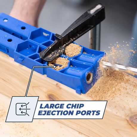 Pocket hole jig with large chip ejection ports clearing sawdust during wood drilling
