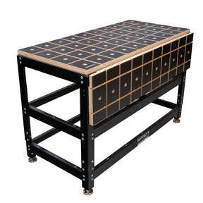 Heavy-duty woodworking workbench with black grid-patterned top and sturdy metal frame
