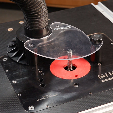 Nautilus dust guard setup on router table with router bit